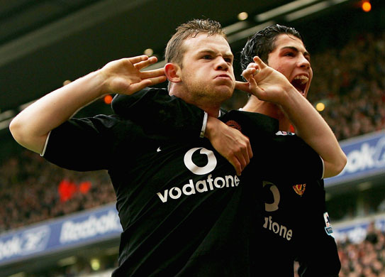 Rooney's goals: Wayne celebrates after scoring against Liverpool