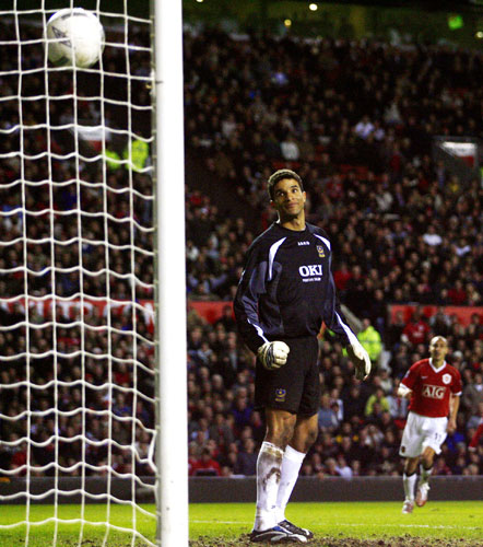 Rooney's goals: David James watches as Rooney's chip goes into the net