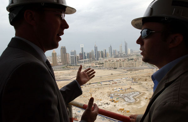 Burj Dubai: Men overlook the the foundations of Burj Dubai