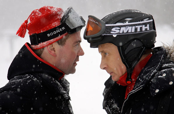Putin and Medvedev: Dmitry Medvedev and Vladimir Putin talk while skiing in Krasnaya Polyana