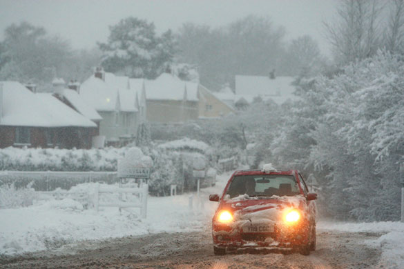 Winter weather: Chieveley, Berkshire, January 6: A car drives through the snow