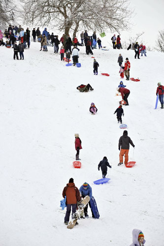 Winter weather: Bristol, Avon, 6 January: People enjoy sledging in the snow