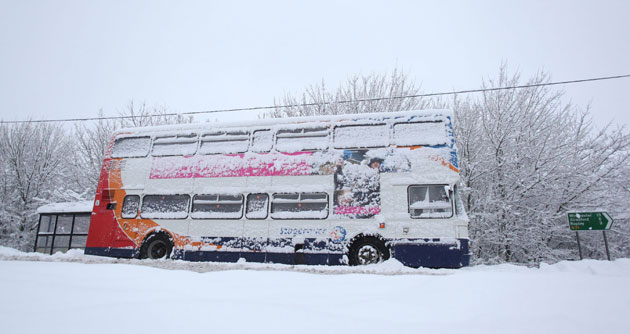 Winter weather: Four Marks, Hampshire, 6 January:  An abandoned bus sits on the A31 