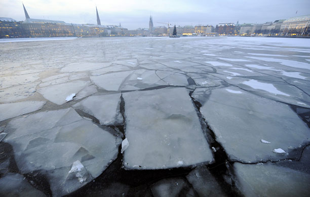 Northern hemisphere: Hamburg, Germany: Large sheets of ice drift on the Binnenalster