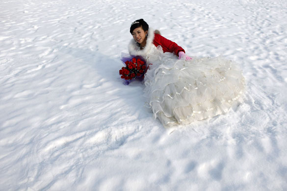 Northern hemisphere: Harbin, China: A bride poses for a photograph