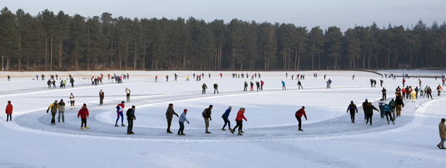 Northern hemisphere: Woudenberg, The Netherlands: People skate on Lake Henschoter