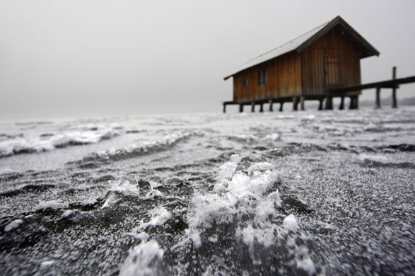 Northern hemisphere: Stegen am Ammersee, Germany: Ice covers the surface of Lake Ammersee 