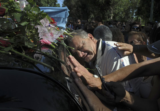 24 hours in pictures: Artentinian mourners for singer Roberto Sanchez, known as Sandro
