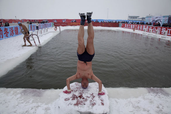 24 hours in pictures: Ice swimming in Harbin China