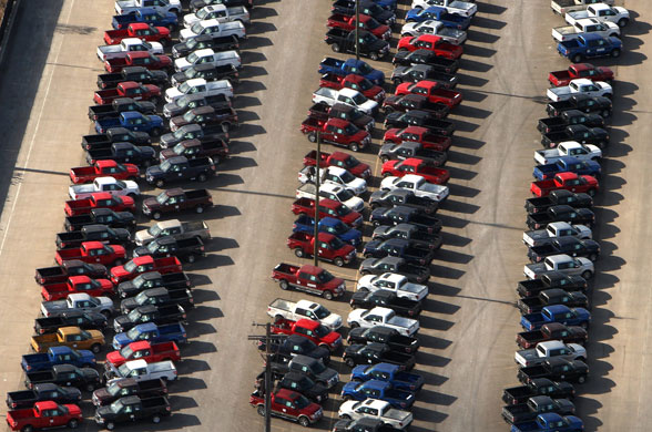 Week in business: Ford F-150 trucks are parked in a lot before being shipped in Detroit
