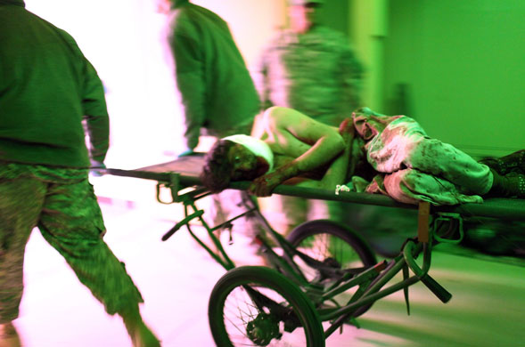 24 hours in pictures: Afghan War Casualties Stream Into Army Trauma Bay In Khost, Afghanistan