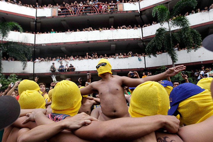 24 hours in pictures: Filipino student protesters run nude against budget cut