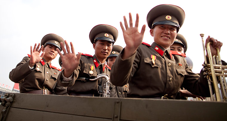 North Korea: North Korean Army Bandmembers wave as they leave the Kim Il-Sung Square