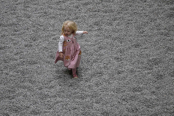  Turbine Hall: A girl runs on the new installation  in the Turbine Hall 