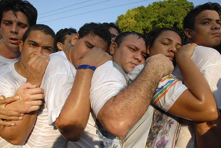 24 hours in pictures: Roman Catholic pilgrims follow Our Lady of Nazareth in Belem
