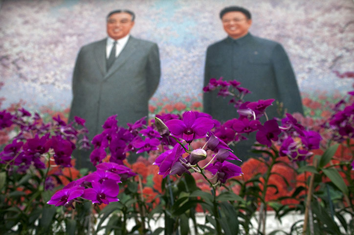 Dan Chung: Portraits of Kim Il-Sung (L) and Kim Jong-Il 