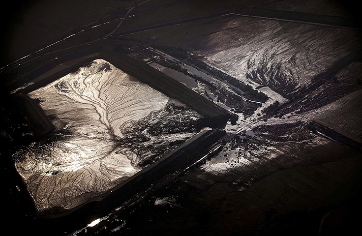 24 hours in pictures: toxic sludge accident in hungary