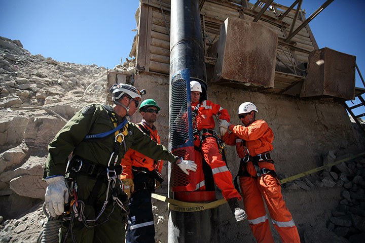 Trapped Chile miners: 10 October: A rescue worker steps out of a capsule 