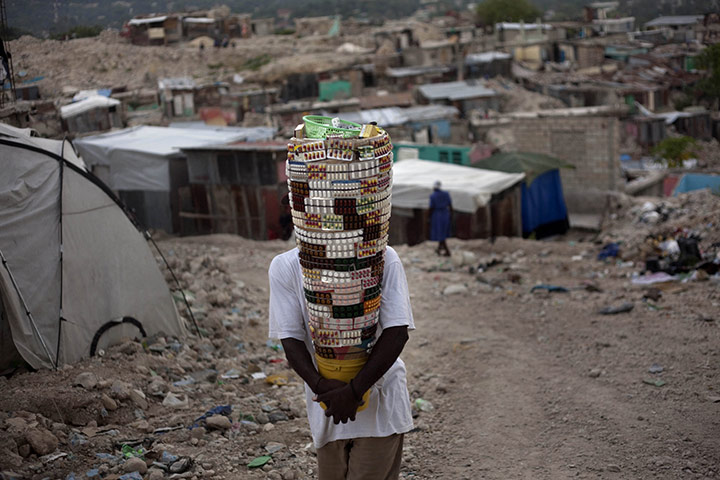 Ramon Espinosa: A vendor carries medicine pills in the Fort Nationale neighbourhood