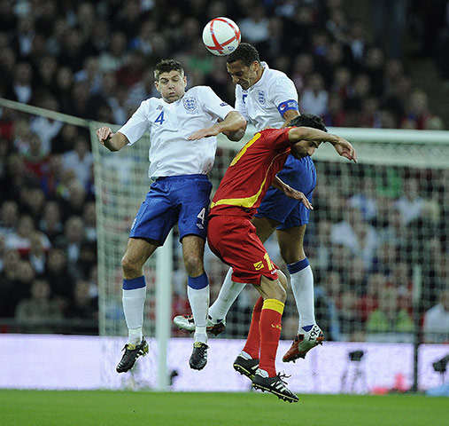 England v Montenegro 2: Steven Gerrard and Rio Ferdinand clear the ball 