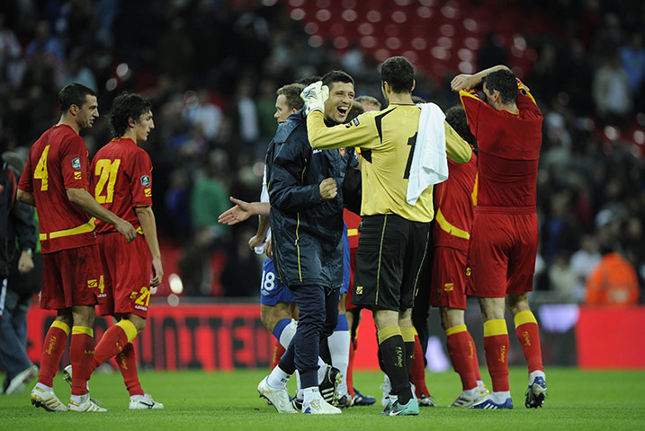 England v Montenegro 3: Montenegro players celebrate after the 0-0 draw at Wembley