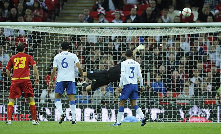 England v Montenegro 3: A Montenegro shot comes off the England bar