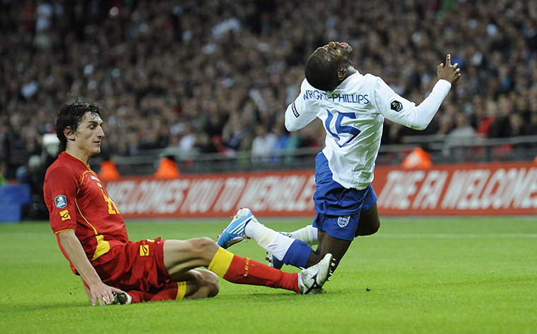 England v Montenegro 3: Shaun Wright-Phillips fouled by Stefan Savic
