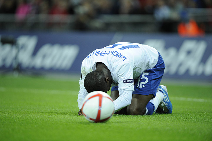 England v Montenegro 3: A dejected Wright-Phillips after he was fouled