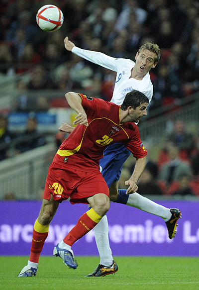 England v Montenegro 3: Peter Crouch and Miodrag Dzudovic