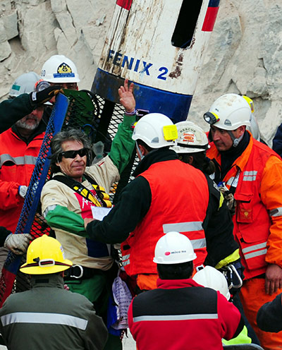 Chile miners rescue: Chilean miner Mario Gomez exits the Fenix capsule in the ninth place