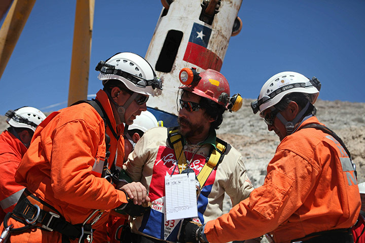 Chile miners are rescued: Victor Segovia leaves the Fenix capsule after being brought to surface 