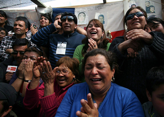 Chile miners are rescued: Relatives of miners Victor Zamora and Carlos Barrios react