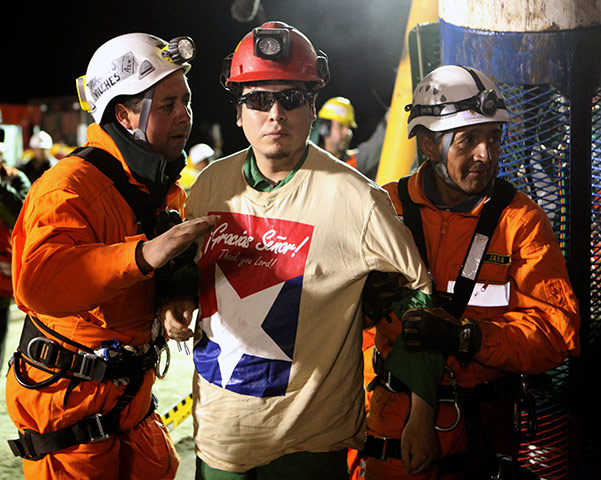 Rescued Chile miners: 31st miner Pedro Cortez is helped by rescue workers 