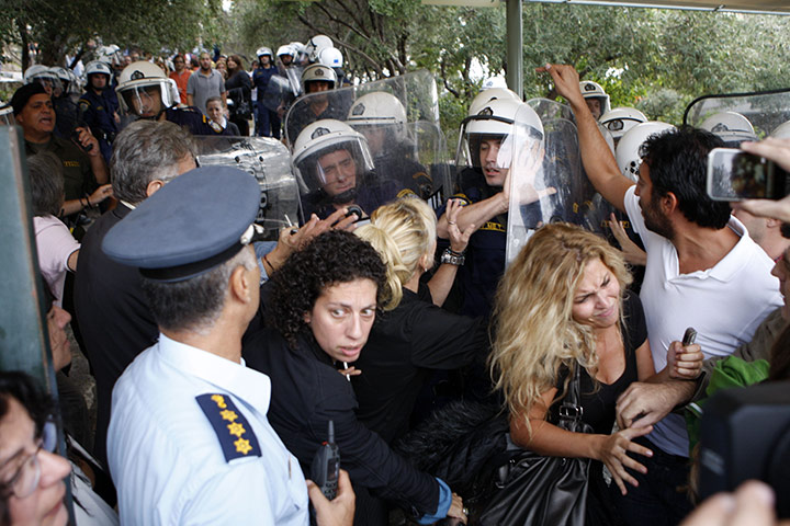 Protest at Acropolis: Protesters clash with police at the entrance to the Acropolis 