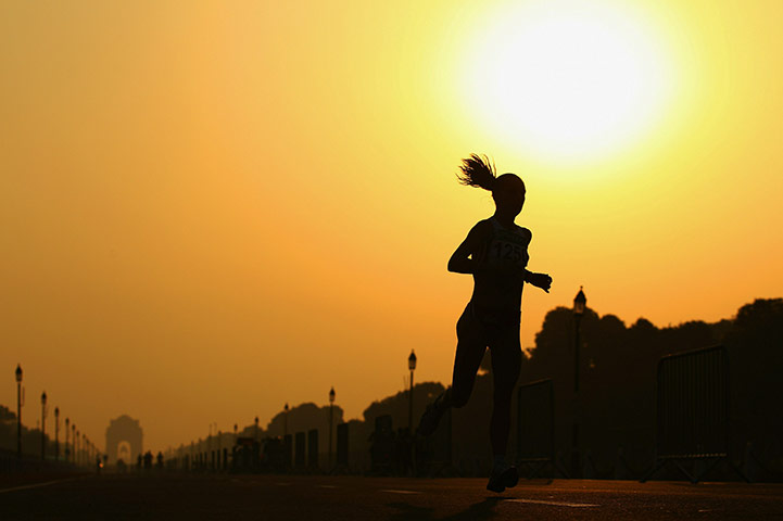 CWG final day: An athlete competes in the Women's Marathon at Vijay Chowk