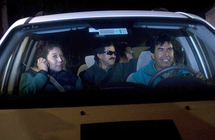 chile miners go home: Chilean miner Juan Illanes is driven away from Copiapo Hospital