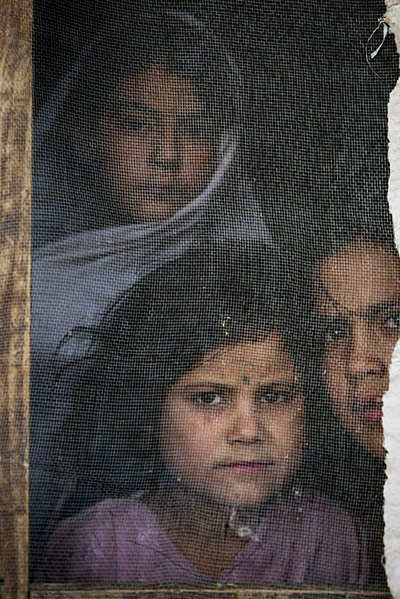 24 Hours in Pictures: Afghan refugees pray at a mosque in the Maslakh refugee camp