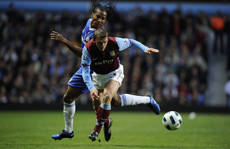 Aston Villa v Chelsea: Malouda and Warnock challenge for the ball