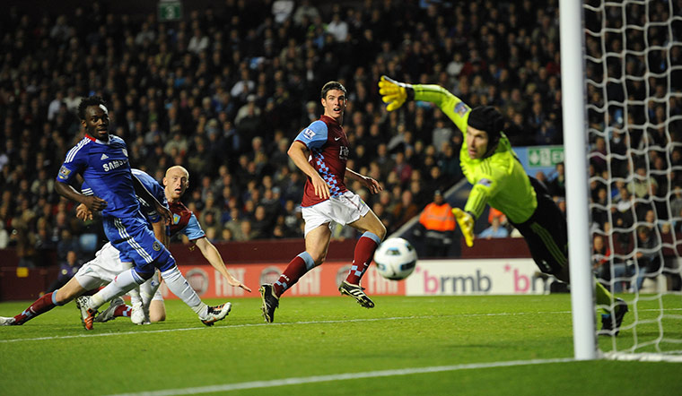 Aston Villa v Chelsea: Ciaran Clark watches his flick header come off the Chelsea post