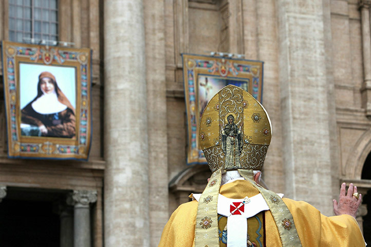Canonisation ceremony: A tapestry Saint Sister Mary MacKillop is draped from the balcony 