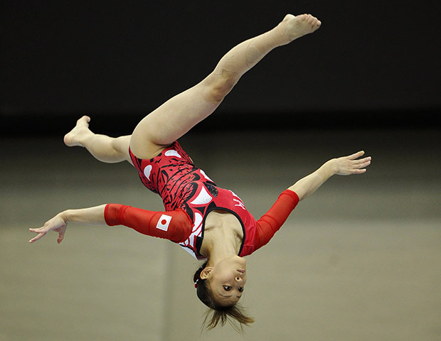 Gymnastics championships: Japan's Rie Tanaka performs on the beam