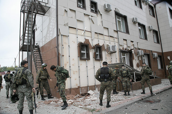chechen parliament attack: special forces outside parliament building in grozny, chechnya