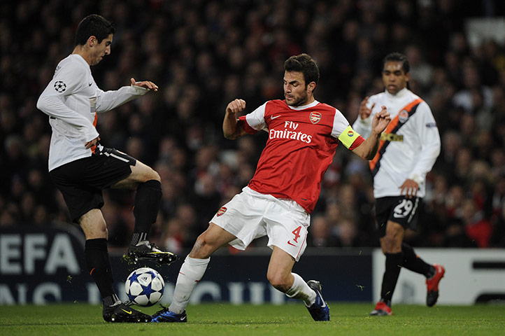 Arsenal v Shakhtar: Cesc Fabregas tackles Mkhitaryan