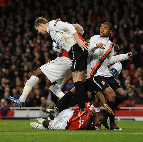 Arsenal v Shakhtar: Djourou is fouled by Adriano for a penalty