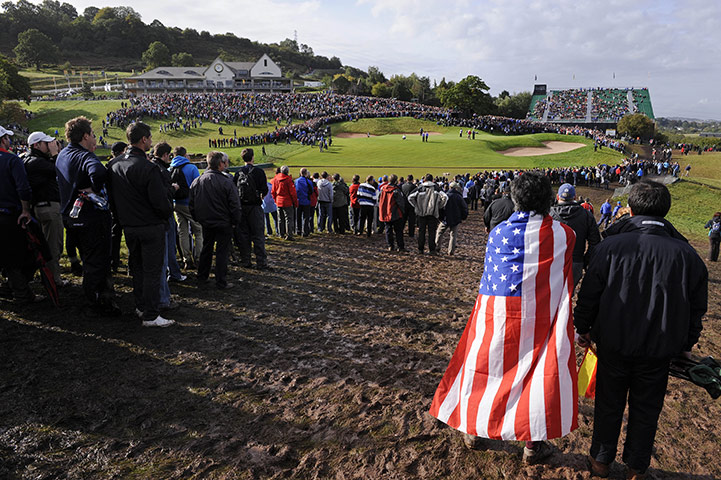 Ryder Cup Day 2: American fans watch Woods and Stricker complete their four-ball on the 18th