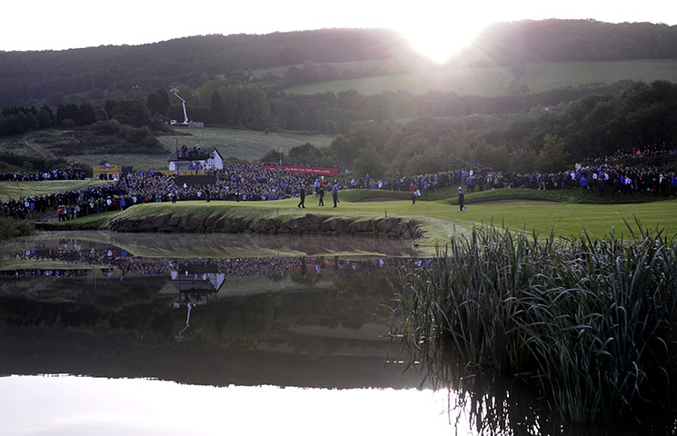 Ryder Cup Day 2: The sun rises on a clear morning as the first match reaches the 14th green