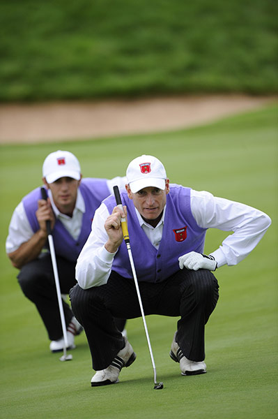 Day 2 Ryder Cup: Dustin Johnson and Jim Furyk line up a putt on the 3rd 