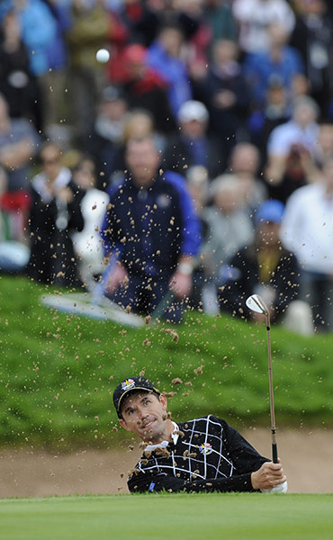Day 2 Ryder Cup: Padraig Harrington plays from the bunker by the 2nd green 