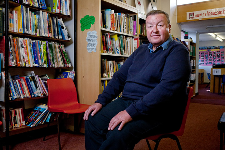 Teaching Awards 2010: A man sits on a chair in a school library