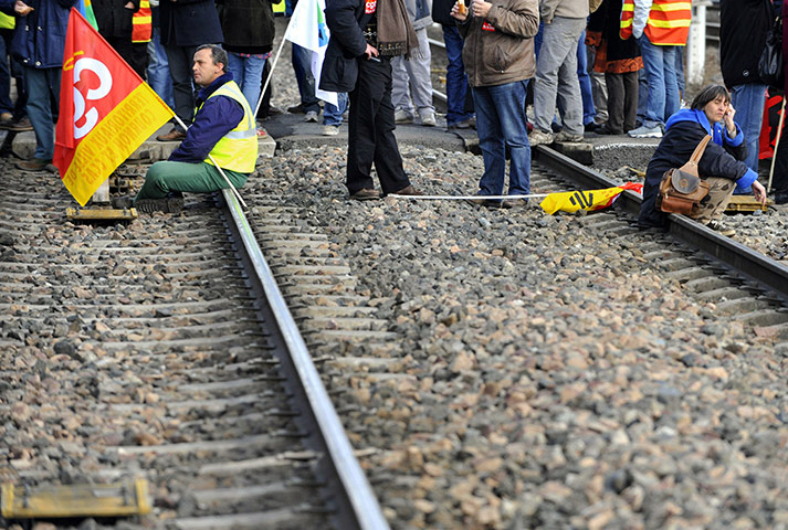 French strikes Wed: French railway workers from state-run company SNCF gather on the railway